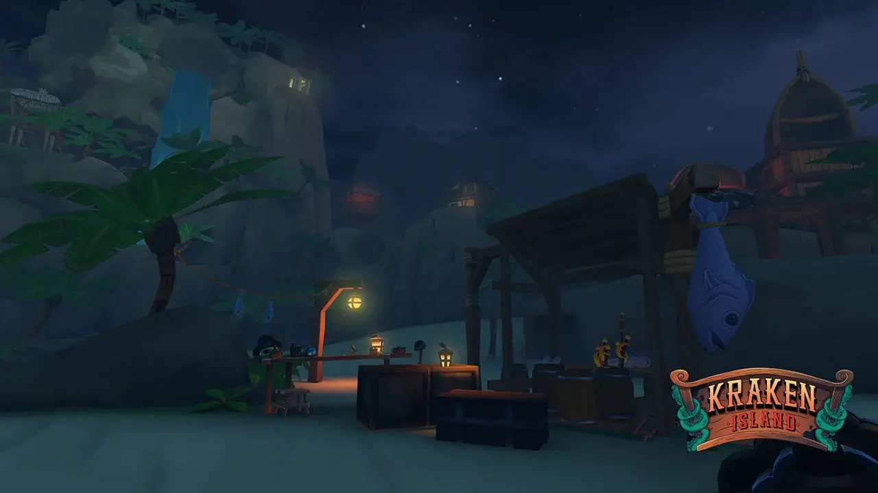 Night-time market stall on the beach with lanterns and cliffs behind